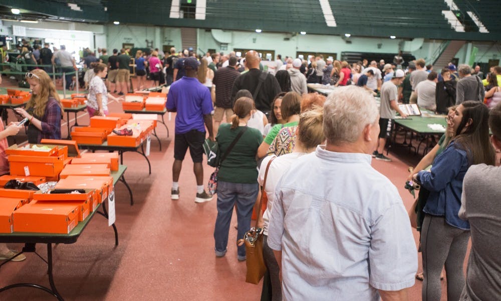 <p>The checkout line is pictured during the Spartan Sports Sale held by MSU Athletics and the MSU Surplus Store on June 3, 2017 at Jenison Field House. The event was held to clean up storage as the MSU Athletic Department moves to the new 1855 Building this Fall. &nbsp;</p>