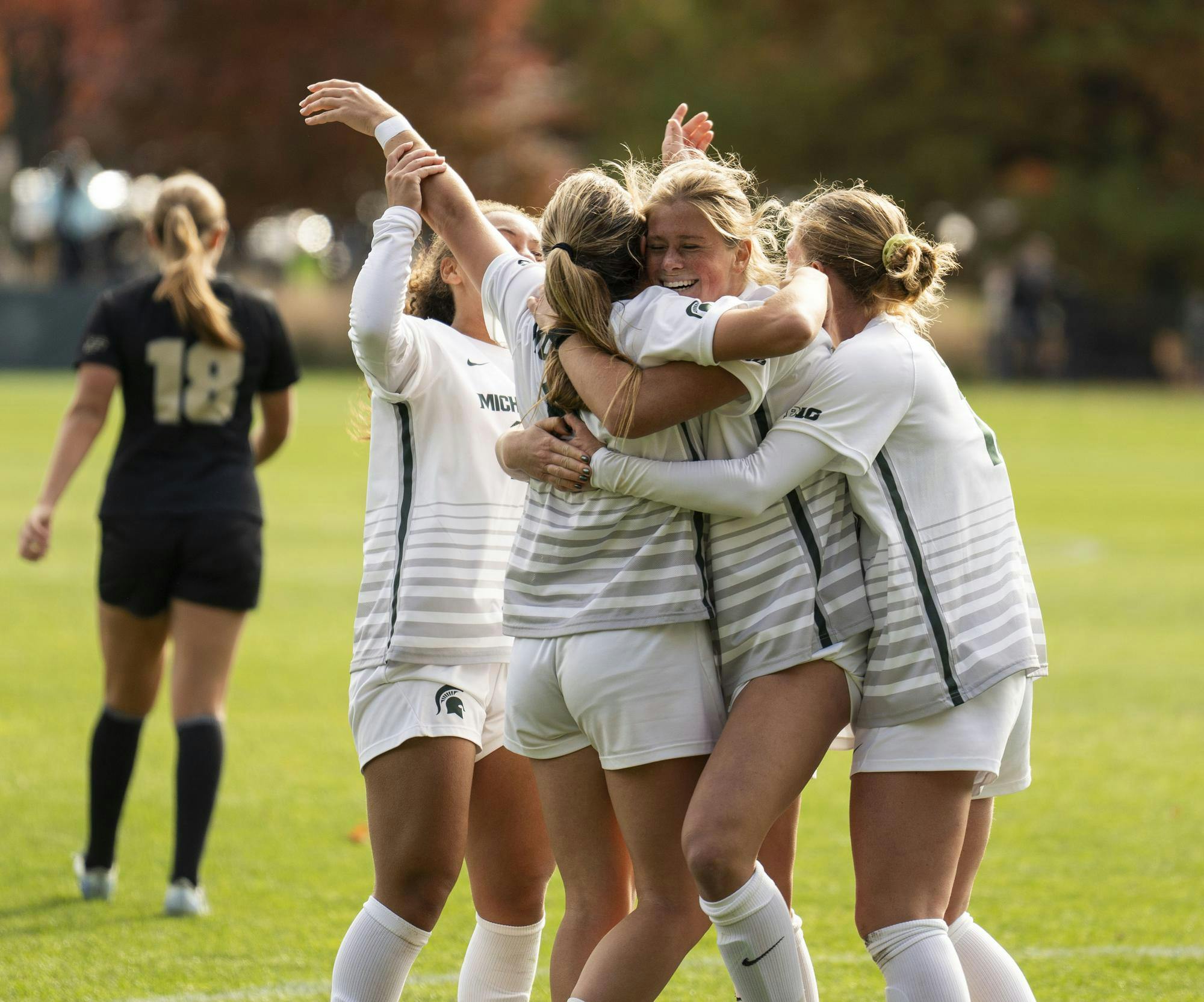 <p>The Michigan State University women’s soccer team celebrates after scoring their third goal against Purdue on Oct. 27, 2024. MSU won the game 3-1.</p>