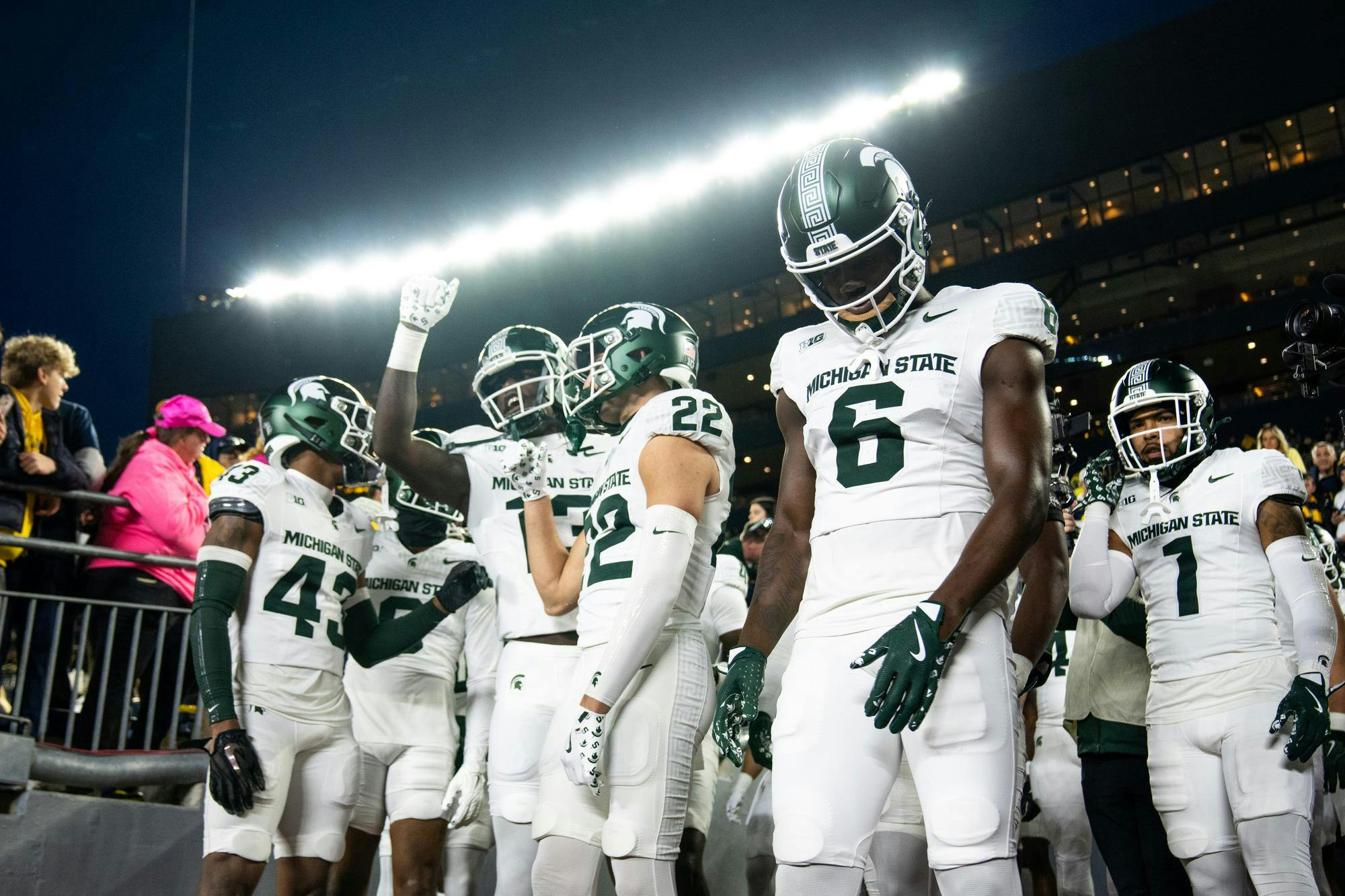 <p>Michigan State players walk out of the tunnel at Michigan Stadium on Oct. 26, 2024. Penalties cost the Spartans their chance at the Paul Bunyon trophy this year as they fell 24-17 to the rival Wolverines.</p>