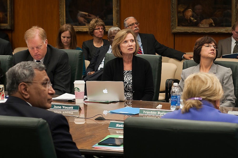 	<p>Acting Provost June Youatt gives a presentation about this year&#8217;s enrollment numbers at the <span class="caps">MSU</span> Board of Trustees meeting Sept. 13, 2013, at the Hannah Administration Building. The Board discussed many topics including new research and events coming up in the new school year. Margaux Forster/The State News</p>