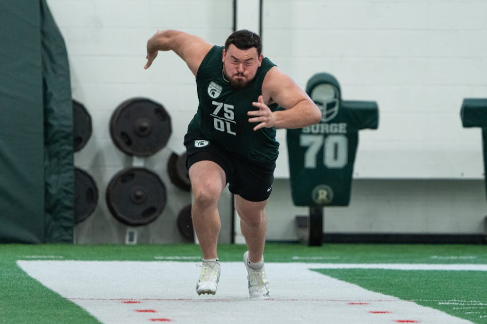 <p>Michigan State redshirt senior Kevin Jarvis giving it everything he has during the 40 yard dash, on Mar. 16, 2022 at the Duffy Daugherty Indoor Football Building.</p>