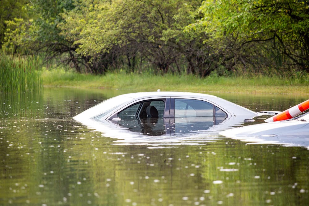 <p>The Quarters in East Lansing on Abbot was afflicted by last night's storms, inundating one of the parking areas and the lower lying apartments Jun 17, 2024.</p>