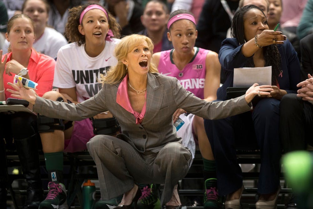 	<p>Head coach Suzy Merchant shouts at the referee to call a foul Feb. 15, 2014, during the game against Ohio State at Breslin Center. The Spartans defeated the Buckeyes, 70-49. Julia Nagy/The State News</p>