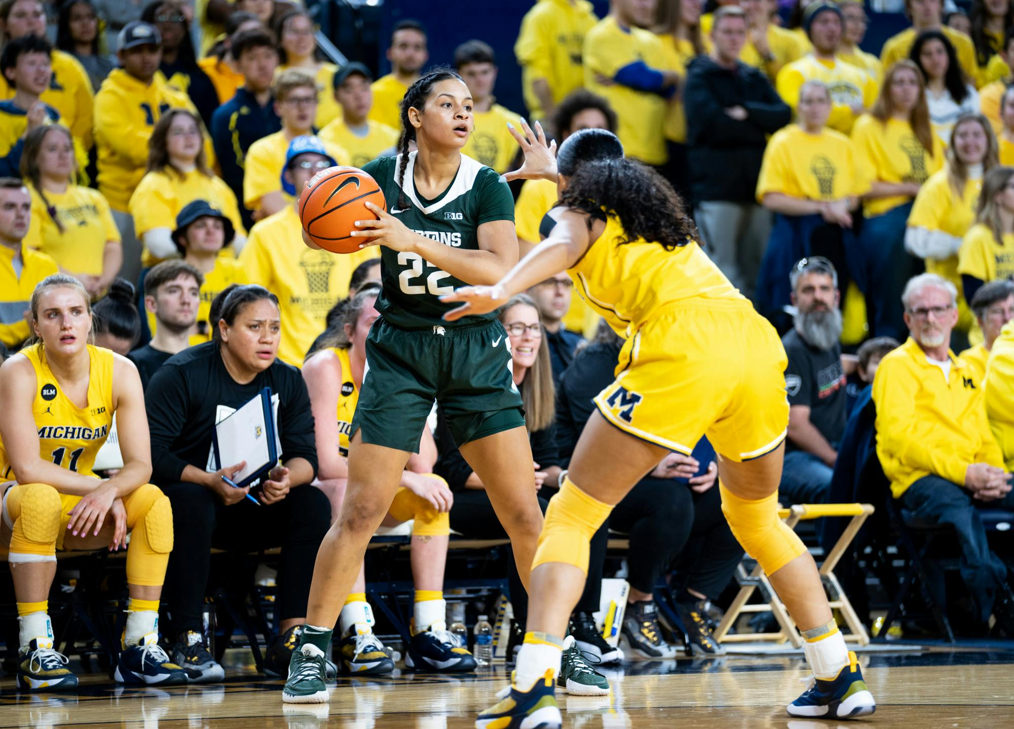 <p>Senior guard Moira Joiner (22) looks to see who to pass the ball to during a game against Michigan at the Crisler Center on Jan. 14, 2023. The Spartans lost to the Wolverines 70-55. </p>
