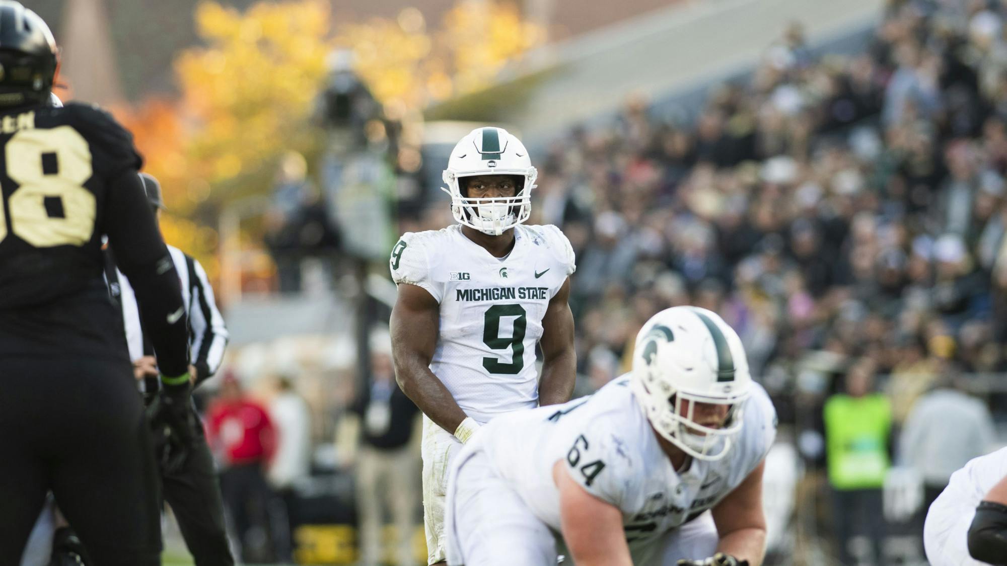 <p>Junior running back Kenneth Walker (9) in the team&#x27;s match against the Boilermakers. Nov. 6, 2021</p>