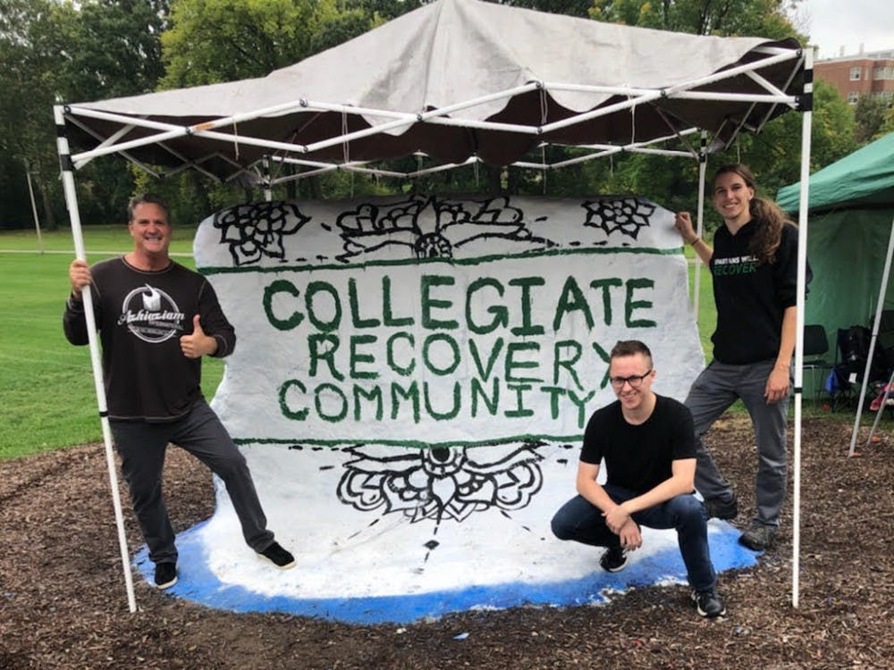 <p>Todd "Z-Man" Zalkins, left, pictured with members of MSU's Collegiate Recovery Community (CRC). Zalkins visited MSU to present his award-winning 2017 documentary “The Long Way Back: The Story of Todd ‘Z-Man’ Zalkins." The documentary detailed Zalkins' 17-year battle and recovery from drug addiction. <strong>Photo courtesy of the CRC.&nbsp;</strong></p>