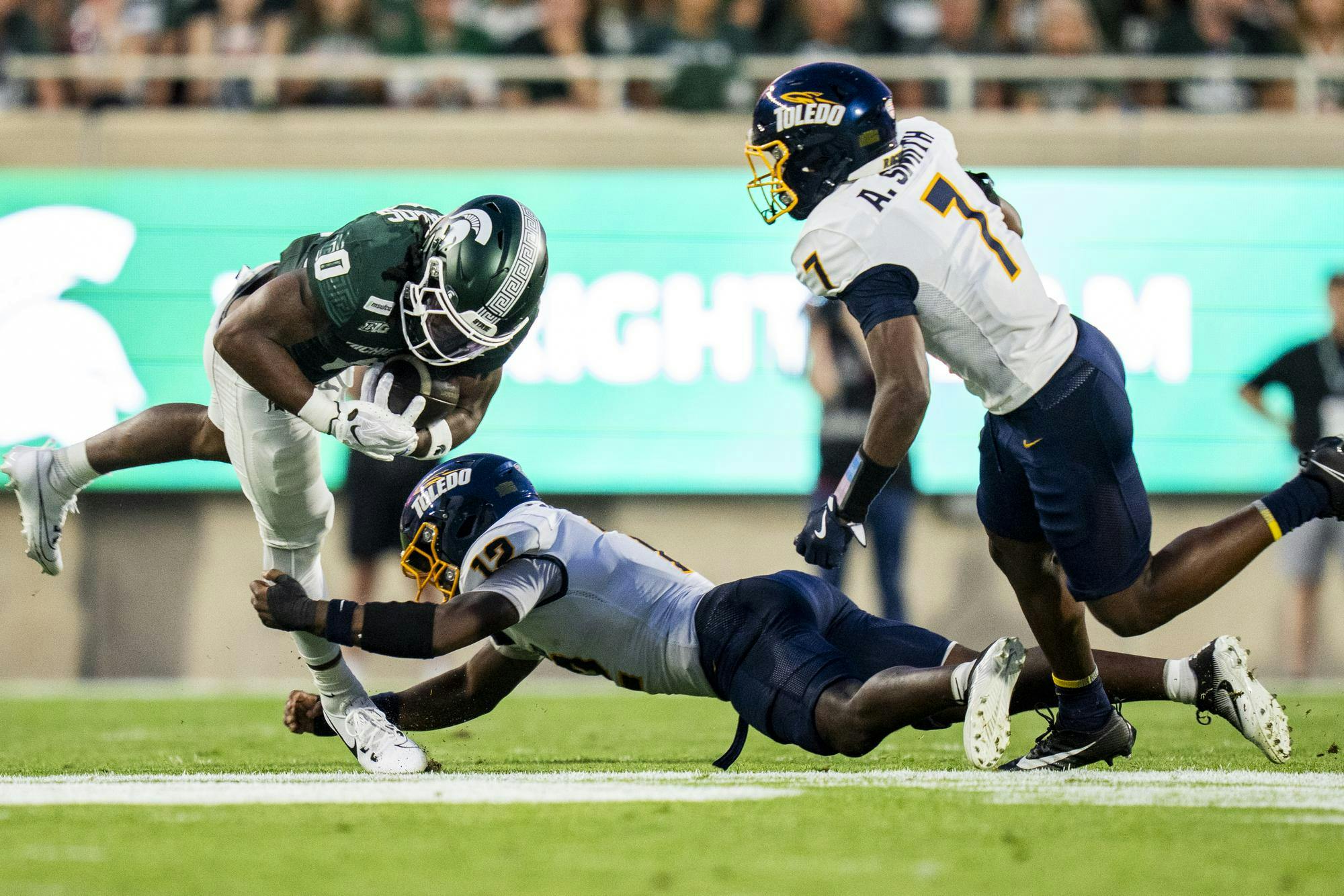 <p>Michigan State senior running back Cam Edwards (0) drives the ball down the field during the Michigan State vs. Toledo football game at Spartan Stadium in East Lansing, Mich., on Friday, Sept. 4, 2026.</p>