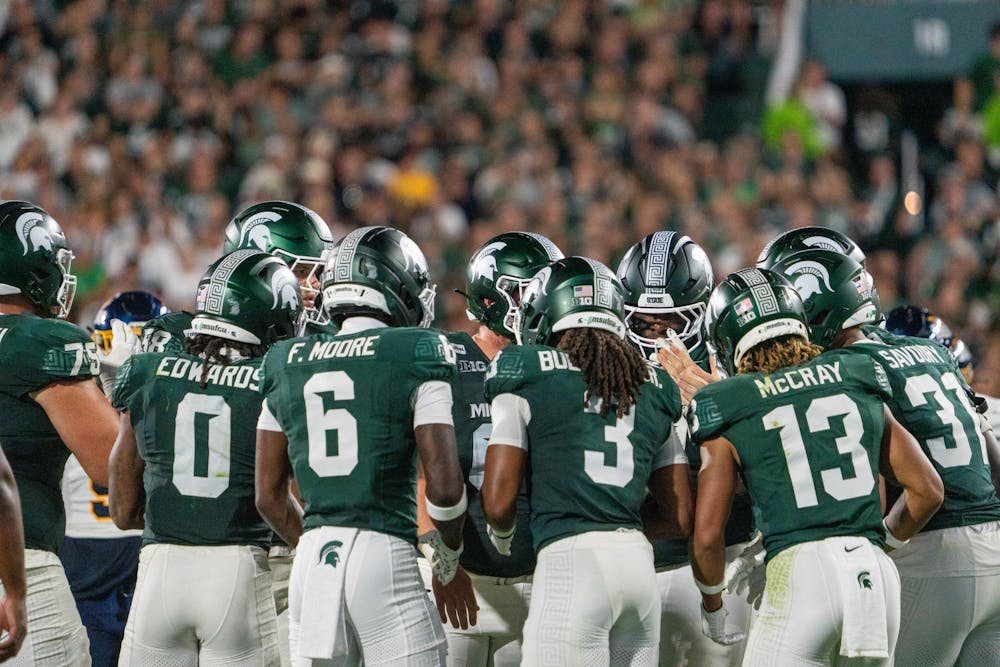 <p>MSU players huddle during the Michigan State vs. Toledo football game at Spartan Stadium in East Lansing, Mich., on Friday, Sept. 4, 2026.</p>