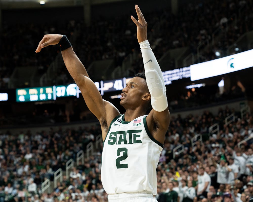 Senior guard Tyson Walker (2) attempts a three pointer during a game against Purdue University at Breslin Center on Jan. 16, 2023. The Spartans fell to the Boilermakers with a score of 64-63. 