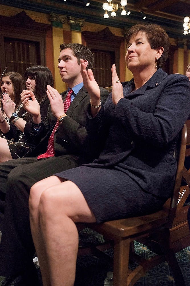 <p>Michigan Governor Rick Snyder's family applauds Jan. 20, 2015, during his speech at State of the State Address at the Capitol in Lansing, Michigan. Emily Nagle/The State News</p>