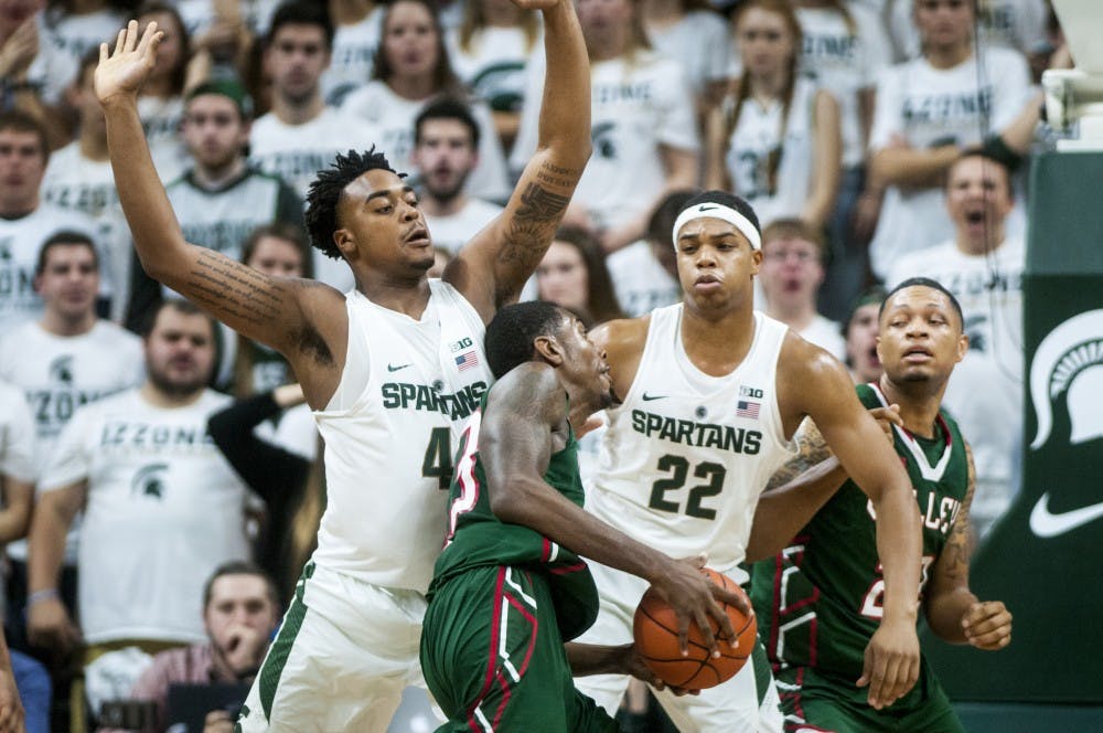 Freshman forward Nick Ward (44) and freshman forward Miles Bridges (22) cover Mississippi Valley State forward Jamal Watson (33) during the game against Mississippi Valley State on Nov. 18, 2016 at Breslin Center. The Spartans defeated the Delta Devils, 100-53.