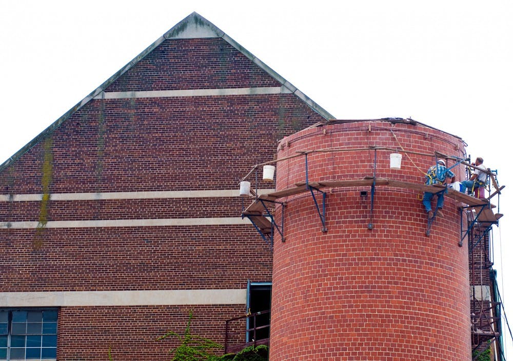 	<p>The <span class="caps">MSC</span> smokestack continues to shrink as construction workers steadily remove bricks Wednesday afternoon.  Many people affiliated with <span class="caps">MSU</span> are saddened by the university&#8217;s decision to demolish this historic landmark.</p>