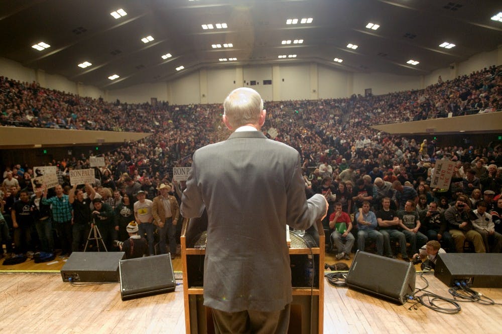 Republican presidential candidate Ron Paul talks on Monday afternoon at the Auditorium in front of a crowd of about 4,000. With about 4,000 in attendance, Paul's MSU visit has been his largest campaign stop turnout ever. Justin Wan/The State News