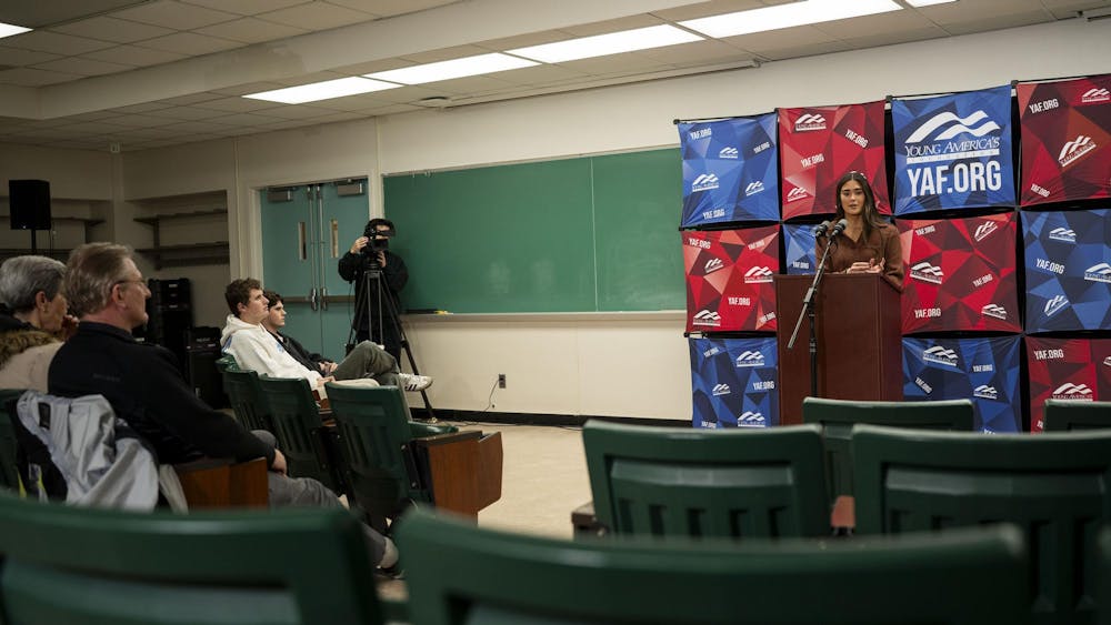 Members of Young Americans for Freedom watch Paula Scanlan talk about her experience as a swimmer at Pennsylvania University in the Biochemistry building at MSU on Nov. 12, 2024. During her time as a swimmer, her team accepted a male to female transgender swimmer. This led Scanlan into politics as she grew outspoken with her beliefs that transgender women should not be allowed on women’s sports teams. 