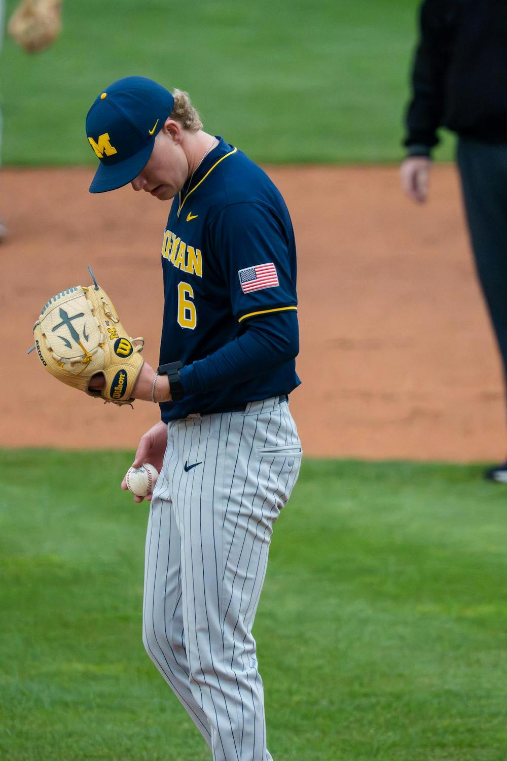 Michigan starting pitcher Kurt Barr, 6, prepares to pitch during Michigan’s game against Michigan State at Jeff Ishbia Field at McLane Stadium in East Lansing, Mich., on Friday, April 10, 2026.