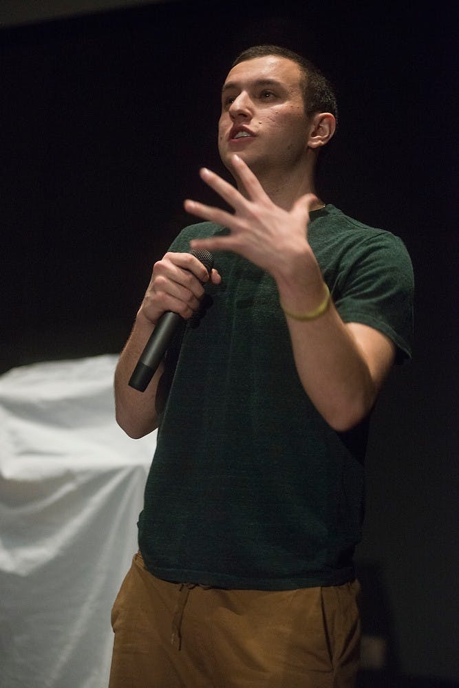 <p>Advertising freshman Sam Silverstein performs at his comedy show on Feb. 4, 2015, for Mott Children's Hospital's charity event Laughter is the Cure to Life held in the MSU Business College Complex, 632 Bogue Street in East Lansing. Silverstein performed comedy for the first time during his high school talent show and his love for performance and the spotlight led him to continue performing at MSU. Emily Nagle/The State News</p>