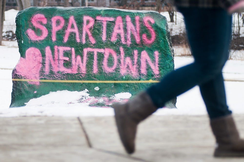 	<p>The rock on Farm Lane is painted with &#8220;Spartans love Newtown&#8221; on Jan. 8, 2013. Newtown, Conn., was the sight of the Sandy Hook Elementary School shooting. Julia Nagy/The State News</p>