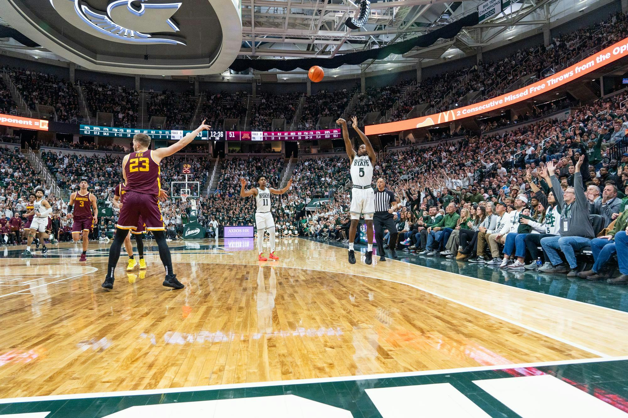 Spartan guard Trey Holloman shoots a three pointer at the Breslin Center in East Lansing on Thursday, Jan. 18, 2024. Holloman recorded 8 points in 22 minutes of play during the Thursday evening matchup.