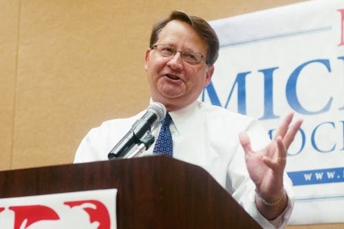 <p>Then-U.S. Representative Gary Peters, D-Bloomfield Township, Mich., addresses the people attending Michigan delegation breakfast at the Embassy Suites in Concord, N.C., on Thursday, Sept. 6, 2012. (Samantha Radecki/The State News)</p>