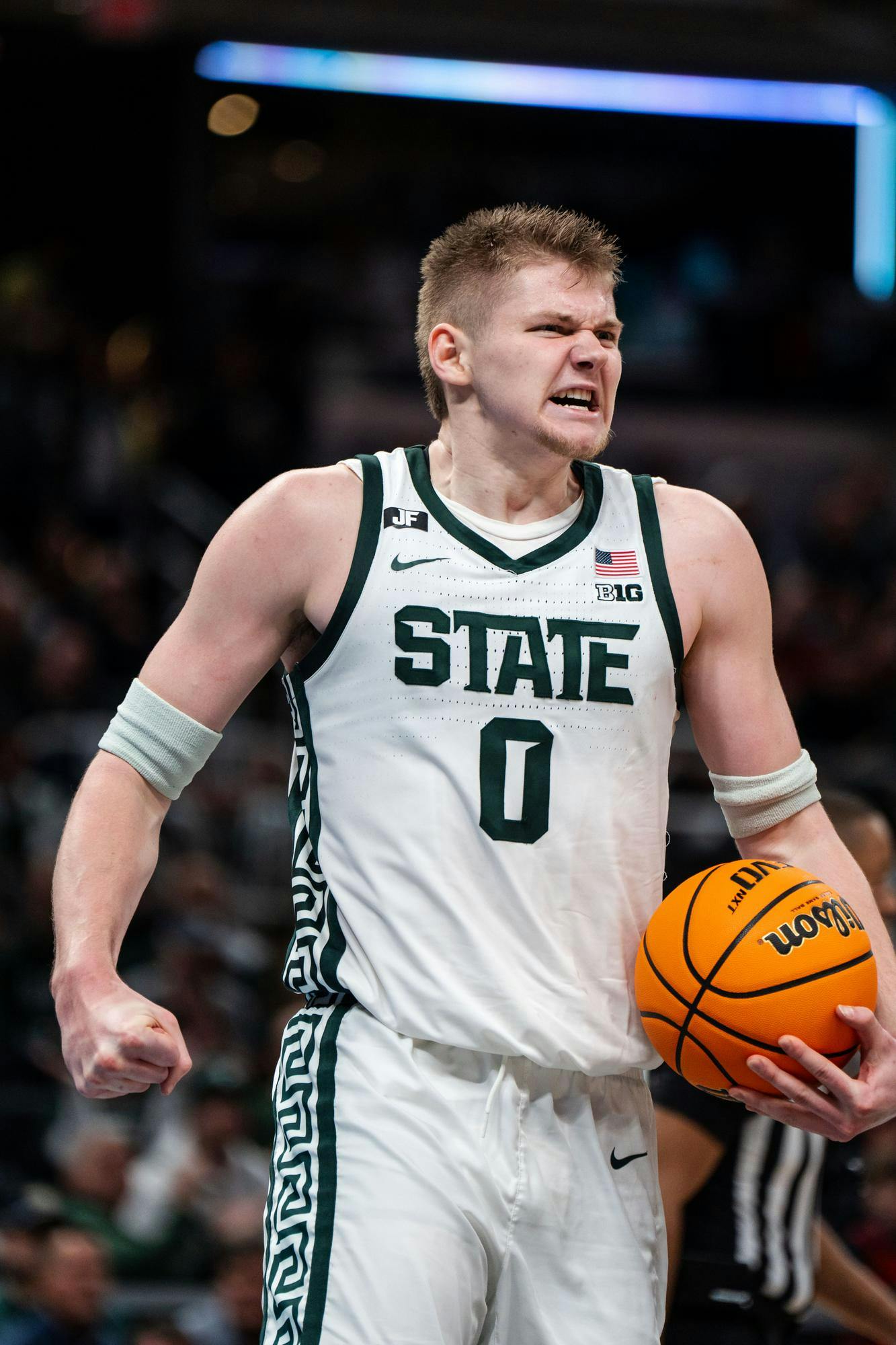 <p>Michigan State junior forward Jaxon Kohler (0) celebrates a play during the Big Ten Conference Tournament at Gainbridge Fieldhouse in Indianapolis on March 15, 2025. Michigan State lost to Wisconsin 77-74.</p>