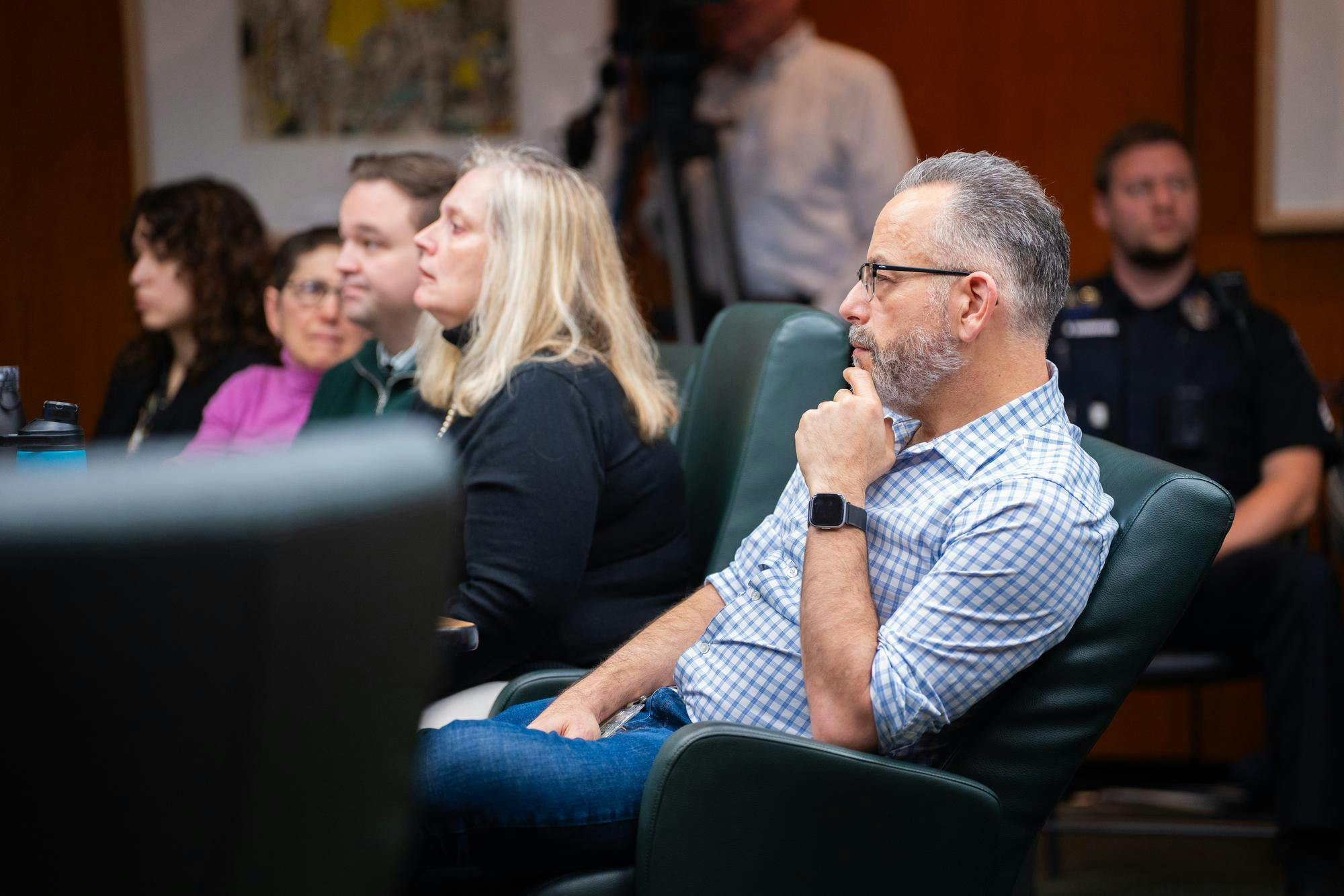 Faculty liaison Jack Lipton listens carefully to a research presentation during a Board of Trustees meeting at the Hannah Administration Building on April 12, 2024.