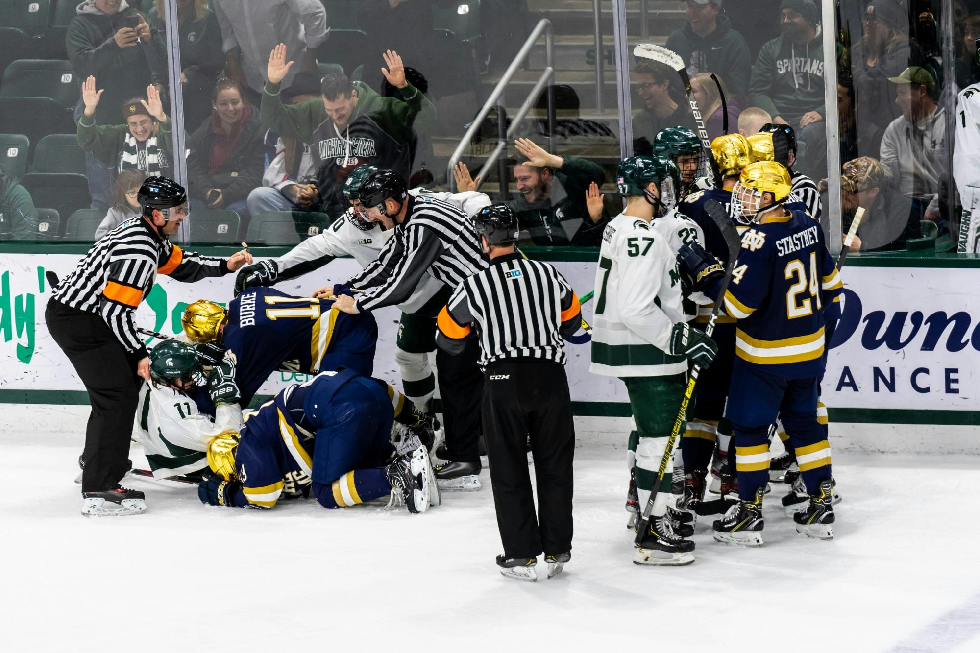 <p>Michigan State and Notre Dame players argue following a hit at the end of regulation. The Spartans tied with the Fighting Irish, 1-1, at Munn Ice Arena on Nov. 22, 2019. </p>