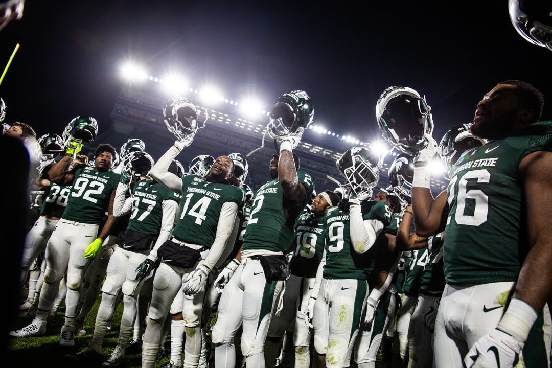 <p>Spartan football team members celebrate during the game Nov. 30, 2019, at Spartan Stadium. The Spartans beat the Terrapins 19-16.</p>