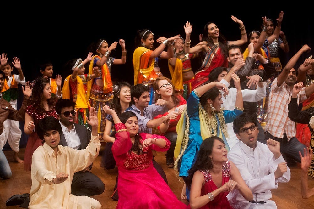 	<p>Cast members of Sargam celebrate together after the end of the show on Nov. 23, 2013, at Pasant Theatre. Sargam is an annual event by the Indian Students Organization, and this year&#8217;s performance was a Bollywood musical theme.</p>