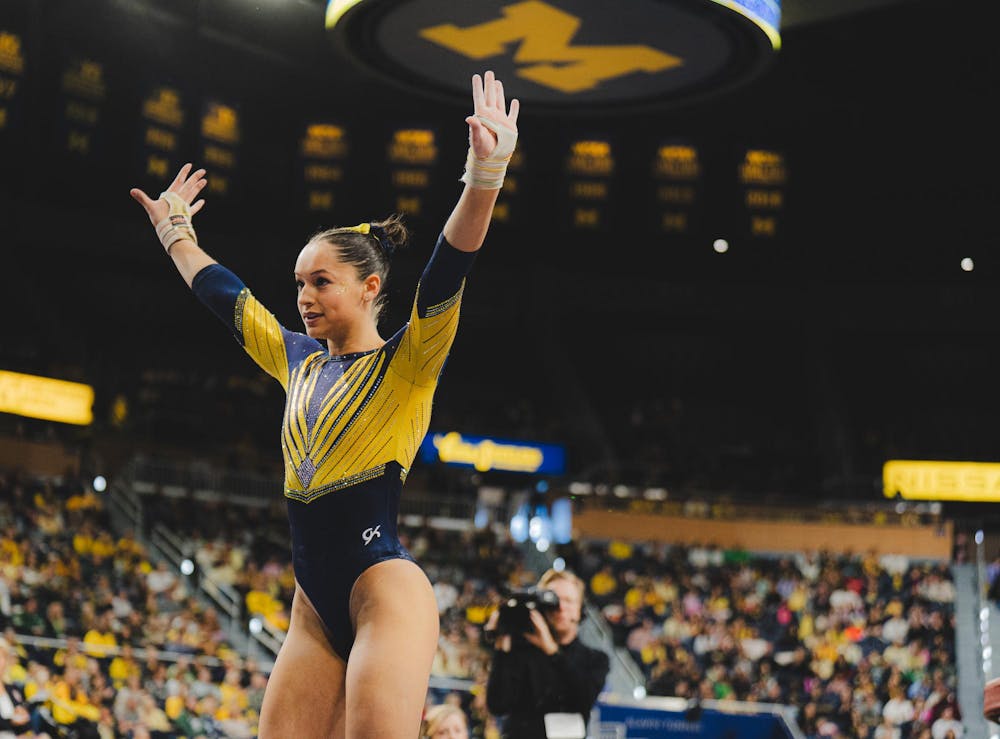 Michigan sophomore Sophia Diaz finishes her floor event at the Crisler Center in Ann Arbor, MI, on Feb. 01, 2026.

