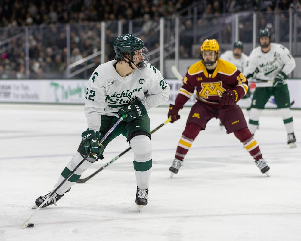 <p>MSU Fr. F, Porter Martone (22), looks for a pass at Munn Ice Arena in East Lansing, MI on Jan. 23, 2026.</p>