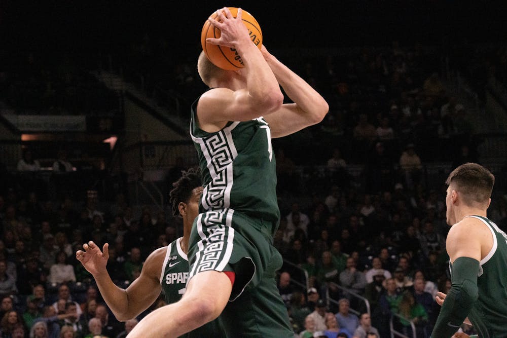 <p>Graduate forward Joey Hauser with a rebound during the Notre Dame v. MSU game held at the Joyce Center on November 30, 2022. The Spartans lost to the Fighting Irish 52 -70.</p>