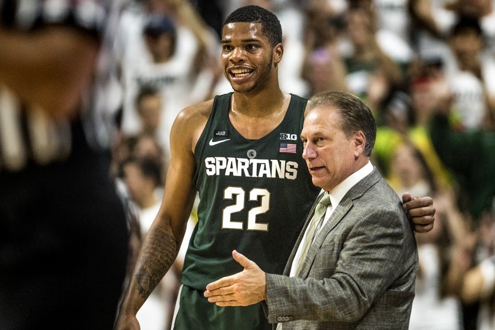 Sophomore forward and guard Miles Bridges (22), left, and Head Coach Tom Izzo talk during the first half of the game against Hillsdale on Nov. 3, 2017 at the Breslin Center.The Spartans defeated the Chargers, 75-44.
