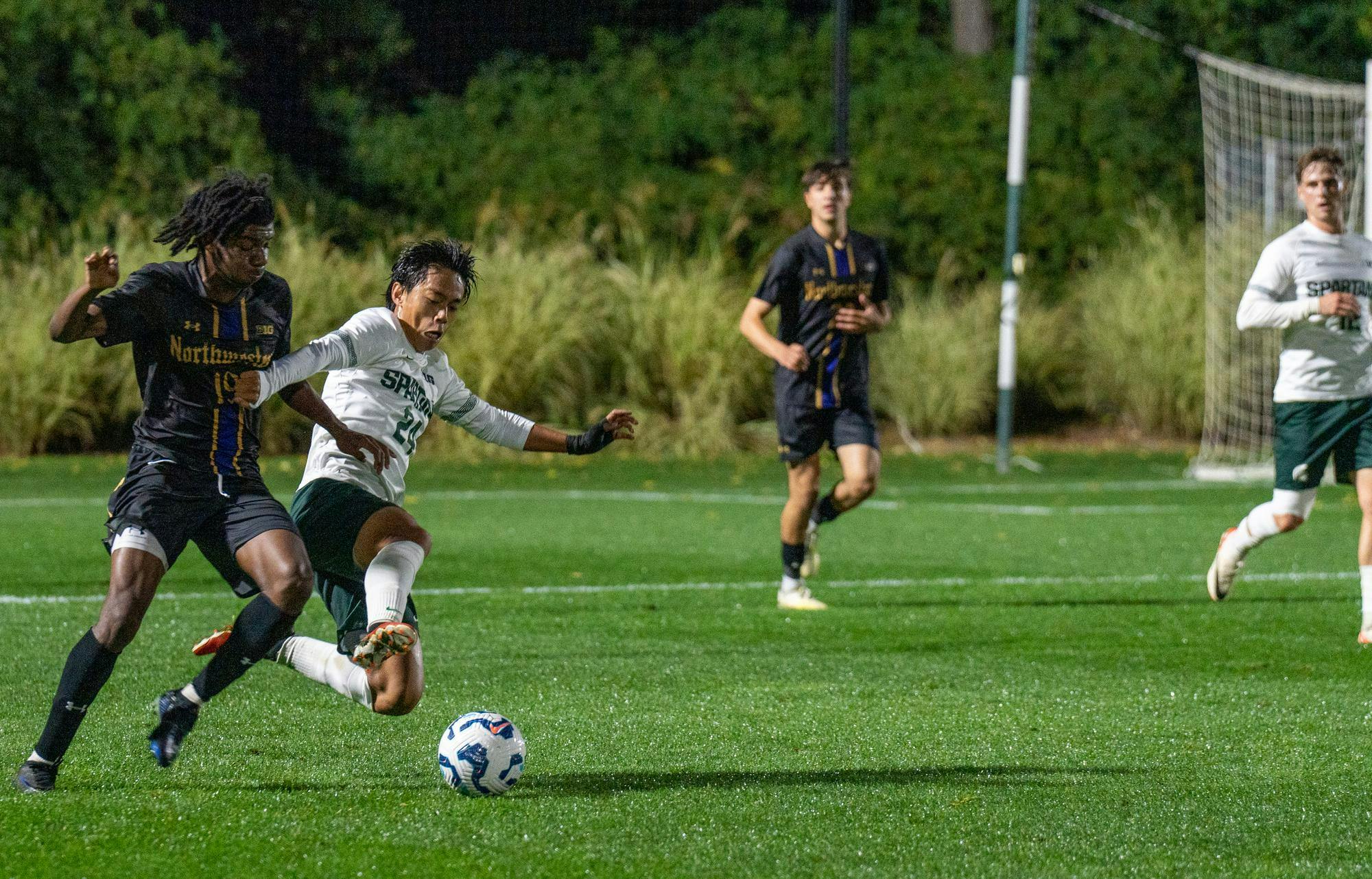 MSU senior midfielder Shion Soga (24) takes the ball from an opponent during their matchup against Northwestern University at DeMartin Stadium on Oct. 1, 2024.