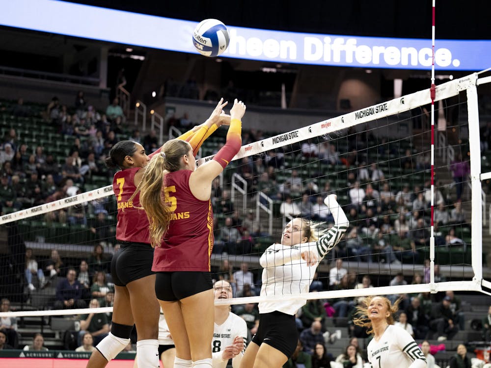 Michigan State junior outside hitter Karolina Staniszewska (2) spikes the ball and scores during the match against USC at the Breslin Center on Wednesday, Nov. 26, 2025.
