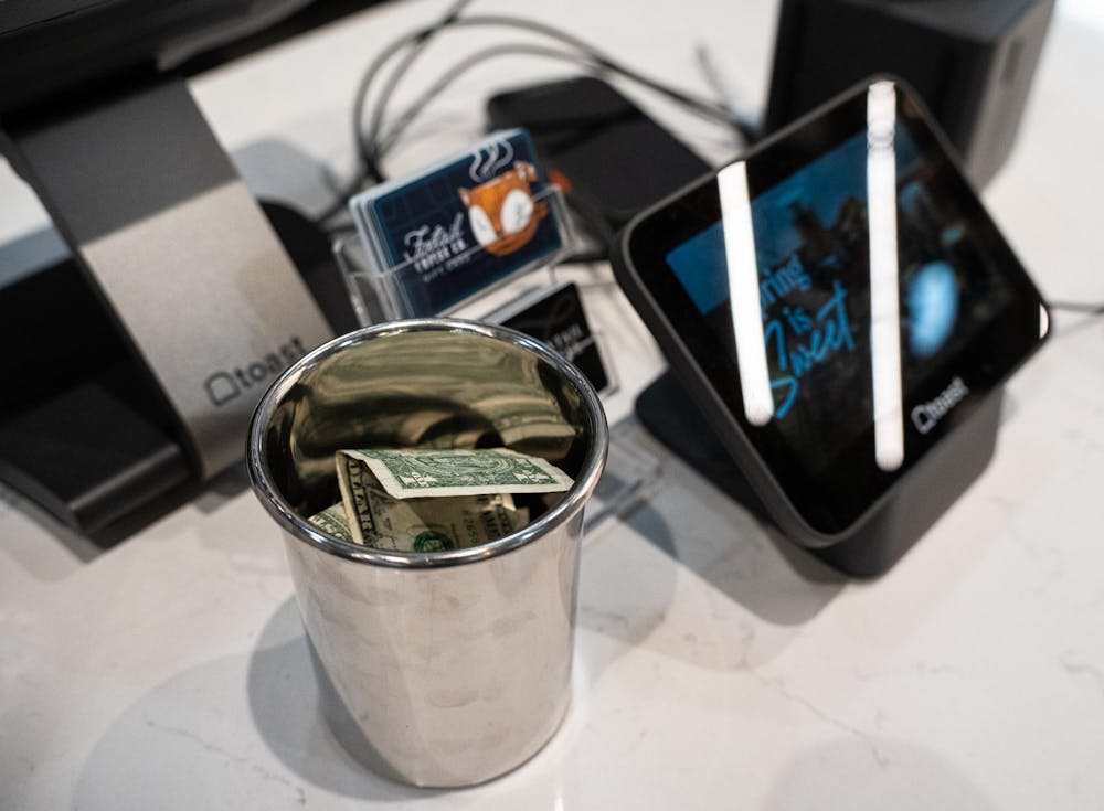 <p>Tip options sit alongside the register at Foxtail Coffee Co. on Grand River Avenue in East Lansing, Michigan, on April 1, 2026.</p>