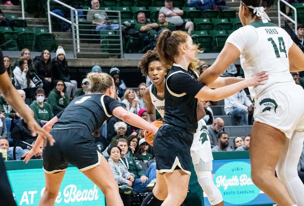 <p>Graduate student guard Kamaria McDaniel (5) is about to pass the ball at a game against Oakland at the Breslin Center on Nov. 15, 2022. The Spartans defeated the Grizzlies 85-39. </p>