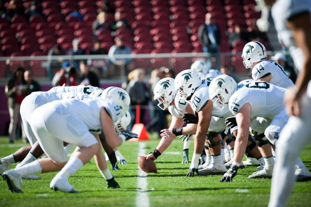 The Spartans warm-up before the Redbox Bowl as they take on the Oregon Ducks at Levi’s Stadium in Santa Clara, CA. on Dec. 31, 2018. (Ben Green/Emerald)