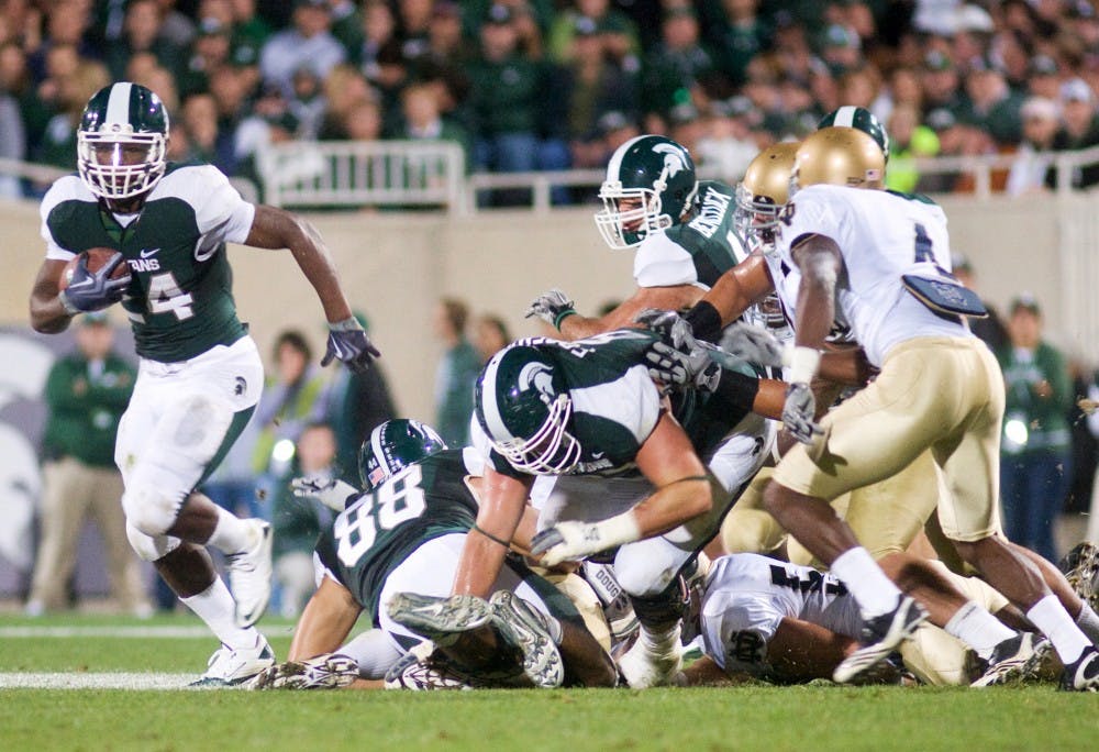 Then-freshman running back Le'Veon Bell breaks away from Notre Dame defense to rush the ball down the field on Saturday at Spartan Stadium.  Bell led the Spartans with 114 rushing yards and 18 receiving yards.  MSU defeated Notre Dame in overtime, 34-31.  