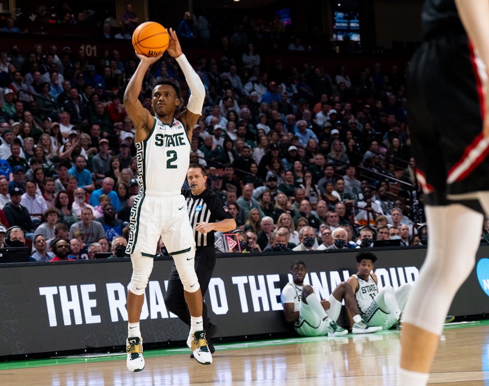 <p>Junior guard Tyson Walker (2) attempts to shoot the ball during Michigan State&#x27;s win over the Davidson Wildcats on March 18, 2022.</p>