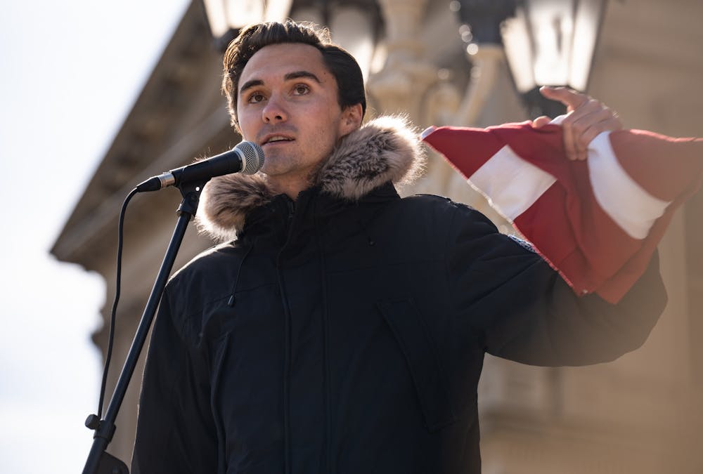 David Hogg of March for Our Lives speaks to students of Michigan State University and the press outside the Michigan State Capitol on Feb. 20, 2023: one week after the mass shooting at MSU and the first day students were scheduled to go back to classes.