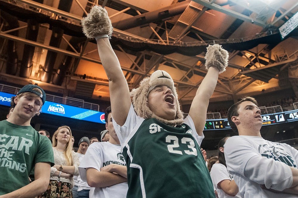 	<p>Communication junior Nathan Dreifus celebrates a Spartan point during the game against Portland on Nov. 18, 2013, at Breslin Center. The Spartans defeated the Pilots, 82-67. Danyelle Morrow/The State News</p>
