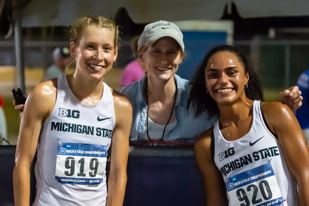 <p>Coach LisaBreznau with Lynsie Gram and India Johnson post-race at the NCAA Preliminary Meet in Jacksonville, Florida from May 26-29 - Courtesy of MSU Athletic Communications</p>