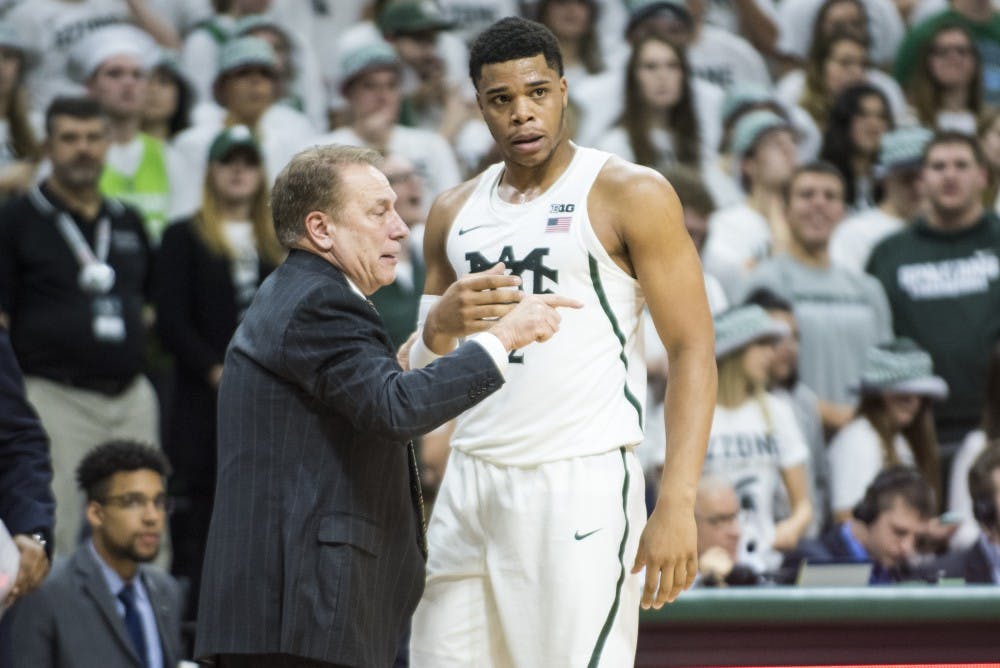 Head coach Tom Izzo and freshman guard and forward Miles Bridges (22) during the men's basketball game against Minnesota on Jan. 11, 2017 at Breslin Center. The Spartans defeated the Golden Gophers, 65-47.