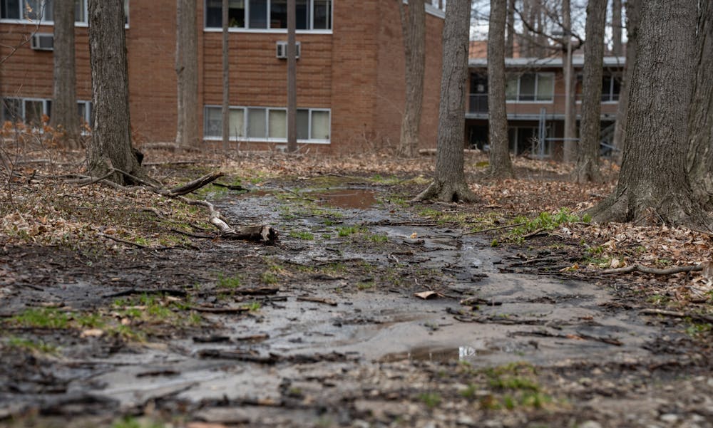 <p>Muddy paths formed near River Trail after heavy rainfall on campus on April 5, 2023.</p>
