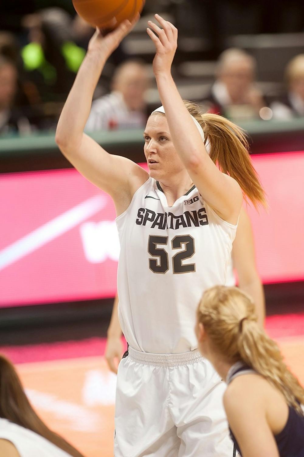 	<p>Junior forward Becca Mills shoots the ball Nov. 23, 2013, at the Breslin Center. <span class="caps">MSU</span> leads against Rice, 32-30 at the half. Margaux Forster/The State News</p>