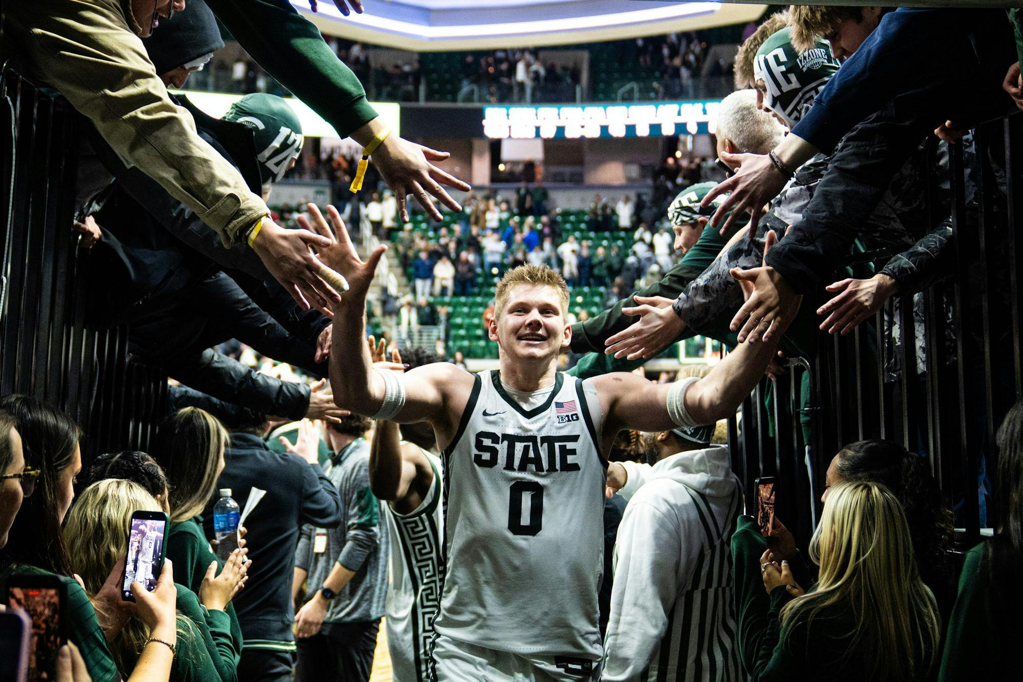 MSU Sr. forward Jaxon Kohler (0) makes his way into the tunnel after beating Illinois during their matchup at the Breslin Center in East Lansing, Michigan on Feb. 7, 2026.