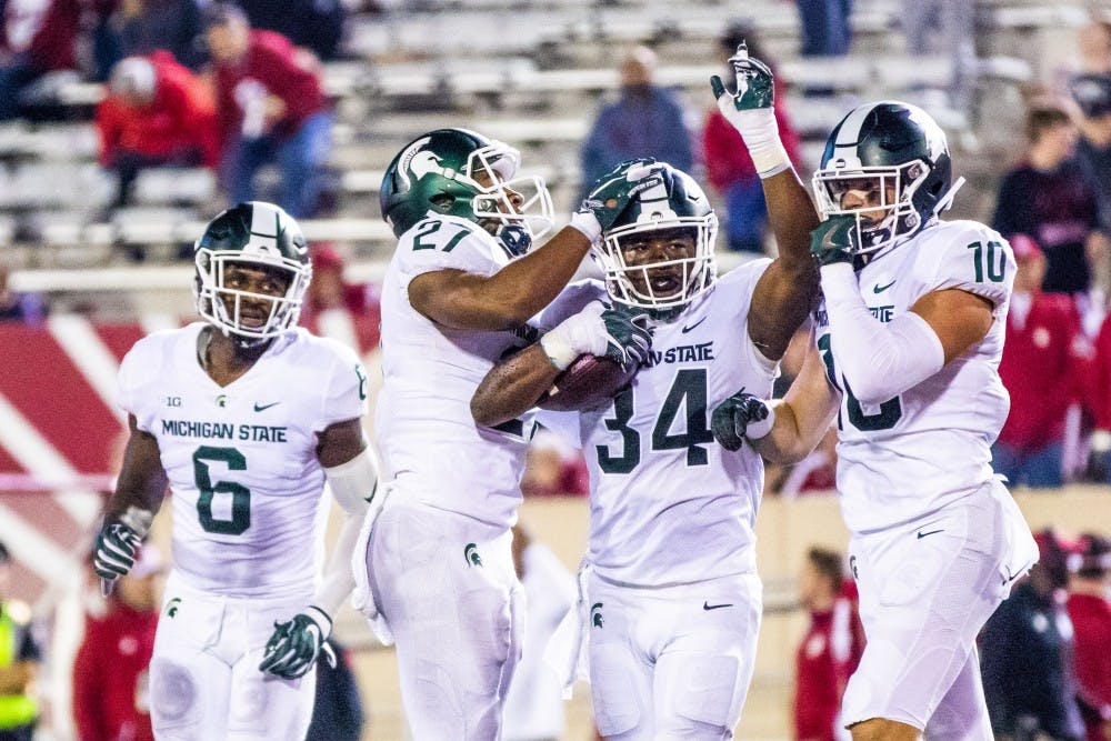 Sophomore linebacker Antjuan Simmons (34) celebrates a game-clinching interception during the game against Indiana on Sept. 22, 2018 at Memorial Stadium. The Spartans defeated the Hoosiers, 35-21.