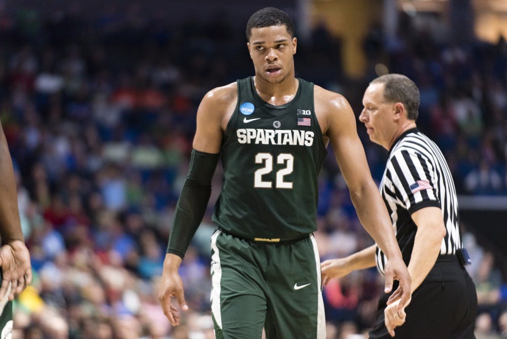 Freshman forward Miles Bridges (22) expresses emotion during the first half of the game against University of Miami (Fla.) in the first round of the Men's NCAA Tournament on March 17, 2017 at  at the BOK Center in Tulsa, Okla.The Spartans defeated  the Hurricanes, 78-58.