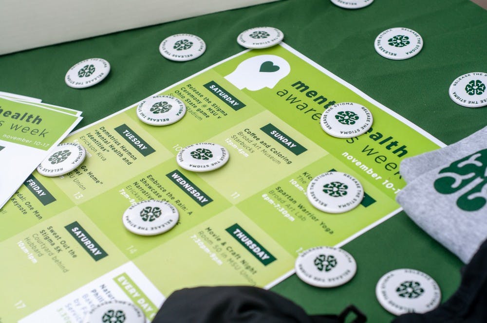 Information and pins at the kickoff event for ASMSU's Mental Health Awareness Week on Nov. 12, 2018.