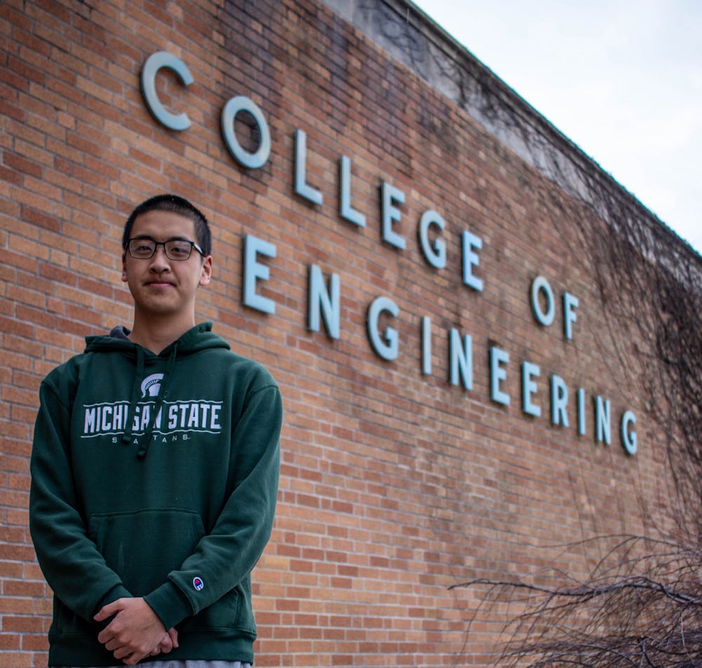 Computer Science freshman Henry Xu poses for a photo outside the College of Engineering on Jan. 23, 2020.